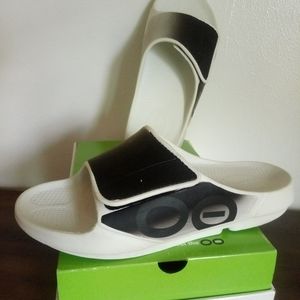 OOFOS Recovery Slides. Discontinued/white with black paint/New in Box.